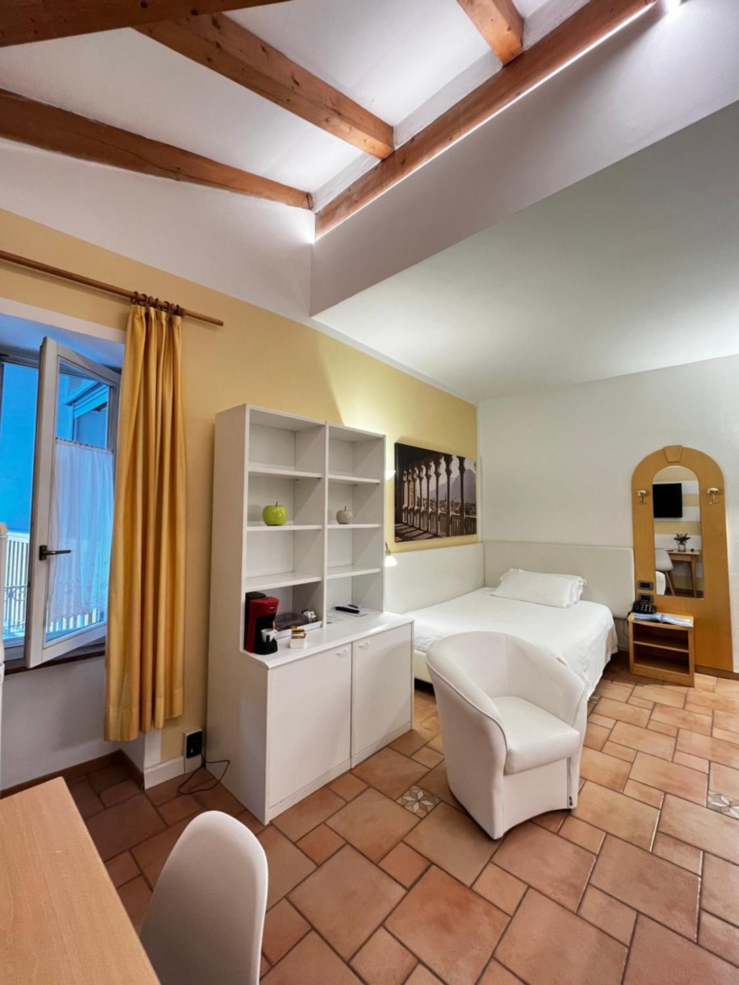 Manci Apartments By Hotel America Тренто Экстерьер фото
